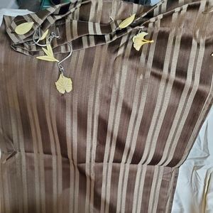 Shower curtain with shell rings